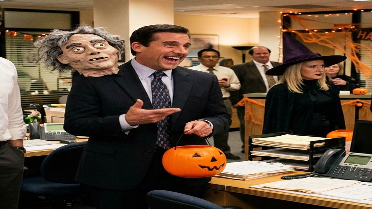 Michael Scott laughing in two headed papier-mache costume on Halloween